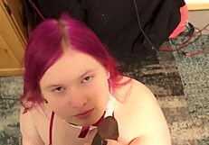 Chubby shemale pinky gulps big black cock close up then takes facial pov