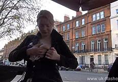 Blonde exhibitionist Amber West risks upskirt pussy flash in public outdoors