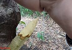 perverted bbw milf slut impales pussy on wooden stake squirting piss in forest