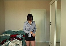 skinny brunette tries on tight skirts showing her assets