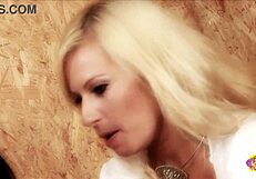 a blonde cowgirl spots brunette in barn and eases her worries