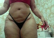 Brazilian milf shakes huge ass and big pussy in sensual pink shorts dance