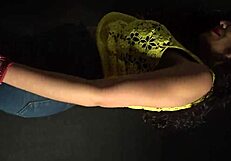 shaking her ass and hips rhythmically in sexy outfit with long nails