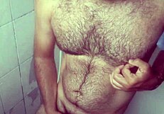 i hide stroking in shower splashing cum over my leg