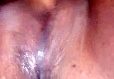 Girl fingers pussy until squirting mess