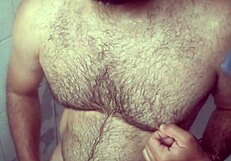 i hide stroking in shower splashing cum over my leg