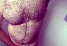 i hide stroking in shower splashing cum over my leg