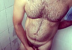 i hide stroking in shower splashing cum over my leg