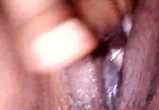 Girl fingers pussy until squirting mess