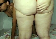 the sexy latina milf in lingerie grabs her vibrator and machine fucks her natural tits heaving until her tight pussy overflows with hot creamy cum