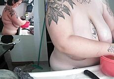 hey watch this busty brazilian housewife scrub dishes totally nude