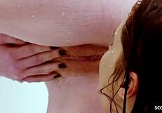 Ever seen a tanned milf's saggy tits bounce while she licks blonde's hairy pussy in shower?