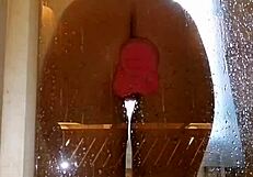 Hey, watch this juicy ass girl spread pussy shower fun with pink dildo...