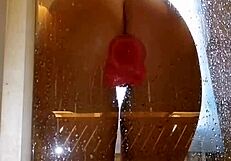 Hey, watch this juicy ass girl spread pussy shower fun with pink dildo...