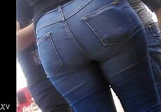 candid mexican teen struts in tight jeans showing off her huge latina ass