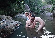 big ass chick bends over river for risky money fuck