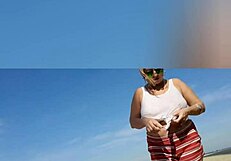 Relaxed solo moment by the beach lighthouse