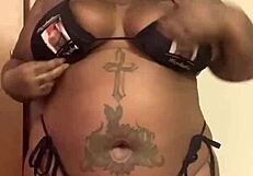 in 2022 xsitebunny struts her ebony big tits in new bikini glow.