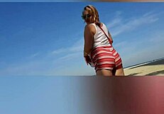 Relaxed solo moment by the beach lighthouse