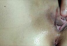 he massages my oiled pussy until i cum closeup