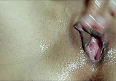 he massages my oiled pussy until i cum closeup