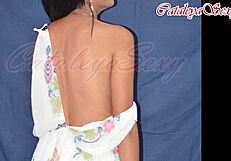 Slim latina model strips naked revealing perfect ass and legs