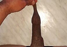 i drip hot wax on my long tattooed foreskin watching my penis swell huge and hard