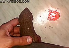 i drip hot wax on my long tattooed foreskin watching my penis swell huge and hard