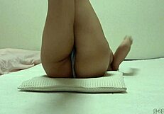 rika aimi flashes her cute tits in slingshot bikini while webcam workout