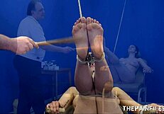 bound slave beauvoir whipped on feet in painful bdsm bondage