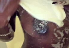 Who's ready for this horny black model gagged and handcuffed riding glass dildo?