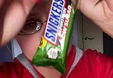 giantess with huge lips glasses long nails smears snickers bar fetish in bar