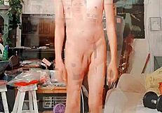 skinny guy strokes his big cock solo in the living room