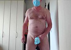 Horny german amateur strips naked wearing corona mouth-nose mask