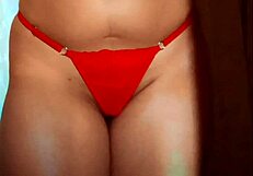 Sexy latina in lingerie does hot striptease shaking her ass