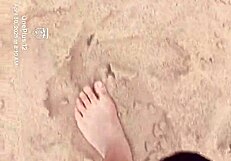 Sand hides bare feet's secret sensory fetish tease