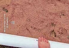 Sand hides bare feet's secret sensory fetish tease