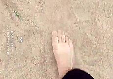 Sand hides bare feet's secret sensory fetish tease
