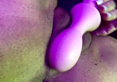 Lexi puffs smoke while vibrating her huge pussy lips and big natural tits