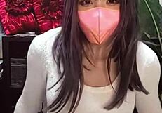 masked asian beauty crossdresses masturbates live on stream