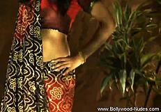 Watch this exotic indian princess dance seductively shaking her brunette curves!