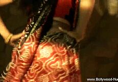 Watch this exotic indian princess dance seductively shaking her brunette curves!