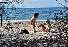 Passionate lovers fuck on beach with female squirting orgasms caught telephoto