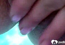 Busty milf spreads shaved pussy lips close up