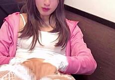 Japanese crossdresser straps drainage net to crotch while masturbating on live stream