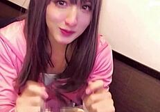 Japanese crossdresser straps drainage net to crotch while masturbating on live stream