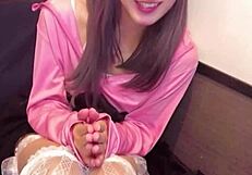 Japanese crossdresser straps drainage net to crotch while masturbating on live stream