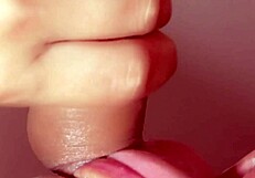 Intimate close-up blowjob from seductive Japanese beauty unfolds