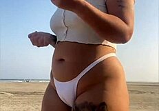 hey beach redhead flashing her swollen big pussy lips 😍 wanna taste?