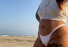 hey beach redhead flashing her swollen big pussy lips 😍 wanna taste?